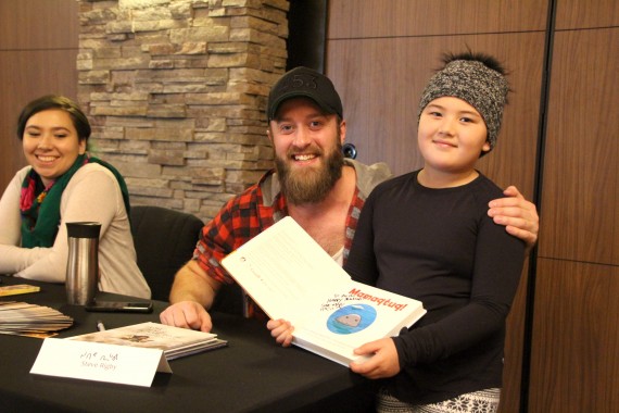 Piunnguallaq Kusugak, 8, of Rankin Inlet holds her signed copy of a new board book released by the Jerry Cans through Iqaluit publisher Inhabit Media. The book is titled after the band’s popular song 