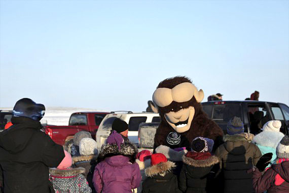 Ollie the muskox, the mascot of Cambridge Bay’s Omingmak Frolics spring festival, greets residents on Friday, May 4. (PHOTO BY DERRICK ANDERSON/RED SUN PRODUCTIONS)

