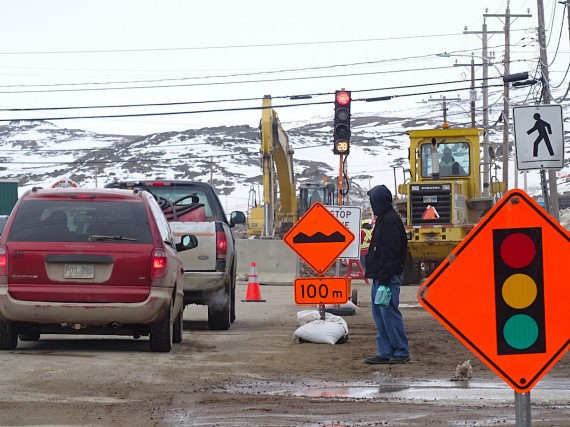 Here’s something you don’t usually see in Iqaluit: a traffic light. This went up Tuesday to regulate traffic on the busy Federal Road while it’s being paved. Many have previously called for a traffic light at the Four Corners intersection, known for its traffic backups at peak hours, but this light is located closer to the RCMP headquarters. (PHOTO BY JANE GEORGE)