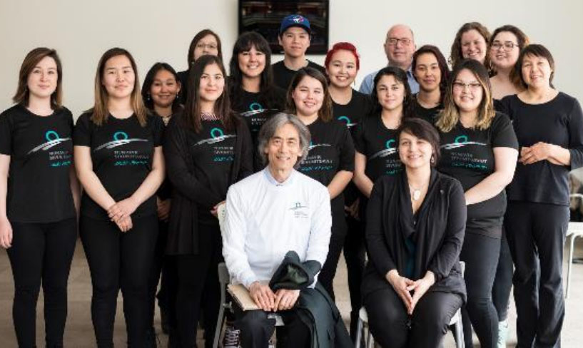 Montreal Symphonic Orchestra head conductor Kent Nagano poses with students from Nunavik Sivunitsavut during a musical collaboration between the organizations earlier this year. (PHOTO COURTESY OF OSM)