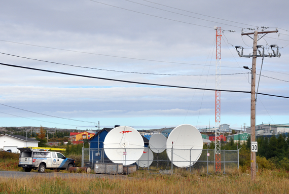 A Tamaani technician checks out some of the service providers' equipment in Kuujjuaq during upgrades done in 2015 to implement 4G technology throughout the region. Starting next month, Tamaani and Ice Wireless will deliver cellular services to all 14 Nunavik communities. (FILE PHOTO)
