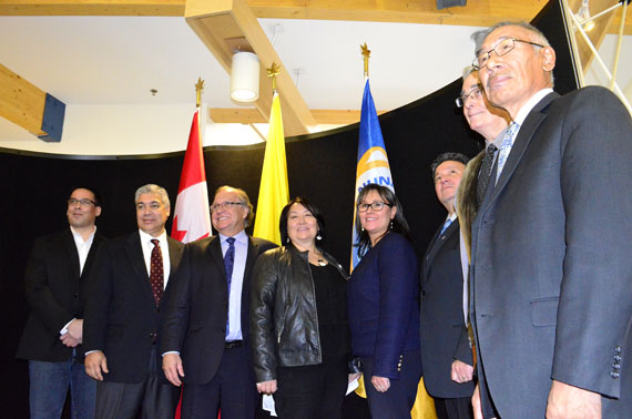 Simon Awa, far right, is back on as Nunavut's chief negotiator for devolution. He's pictured here with members of the negotiating team in October 2014, shortly after he was first appointed to the role. (FILE PHOTO)