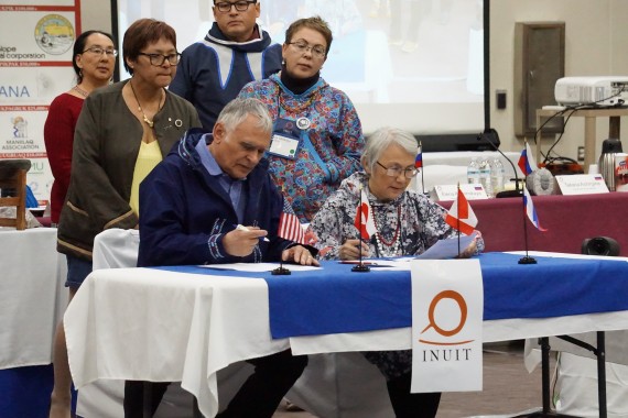 Jimmy Stotts of ICC Alaska and Tatiania Achirginia of ICC Chukotka sign Utqiagvik Declaration. (PHOTO COURTESY OF YERETH ROSEN/ARCTIC TODAY)
