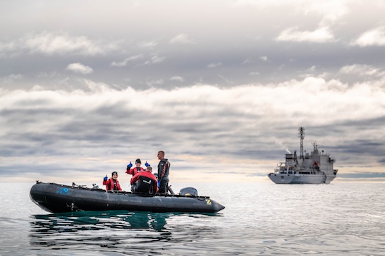 Earlier this month a team of divers from the Ocean Wise organization used the Akademik Ioffe, which lies in the distance in this photo. The cruise ship's operator, One Ocean Expeditions, says that family members of passengers or crew who have questions about the ship's grounding may phone 1-855-416-2326 or send an email to guestservices@oneoceanexpeditions.com. (PHOTO COURTESY OF ONE OCEAN EXPEDITIONS)