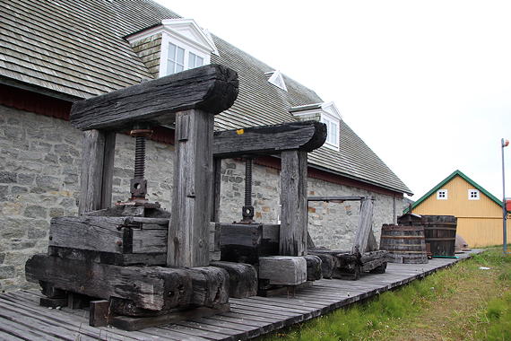 In the mid-1900s Greenland communities were known for manufacturing train oil, a product sold by the Denmark company KGH for use in lighting, soap and lubricating oils. The product—taken from the skin of whales, walruses and seals by using vats, presses and tubs like these—fell out of use in the early 1960s when vegetable oil became more common. (PHOTO BY BETH BROWN)