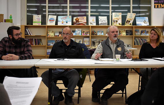Doug Workman, chair of the Iqaluit District Education Authority, speaks during the organization's annual general meeting on Monday, Oct. 15. He says Nunavut's Education Department incorrectly counted the number of students in the city, and as a result, shortchanged Iqaluit's schools by three teaching staff and gave the DEA a smaller budget than it should have received. (PHOTO BY COURTNEY EDGAR)