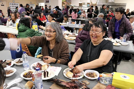Having a blast: The Qikiqtani Inuit Association threw a community feast at Iqaluit's Inuksuk High School on the evening of Tuesday, Oct. 3, to coincide with the organization's annual general meeting. (PHOTO COURTESY OF QIA)