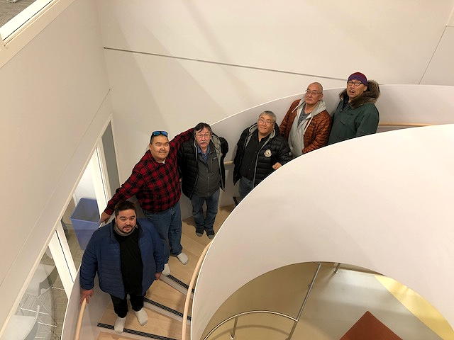Members of the Kitikmeot Inuit Association's board stand on a staircase in the Canadian High Arctic Research Station in Cambridge Bay during a tour of the facility last month. During the KIA’s annual general meeting, delegates asked for health to be one of the new focuses of research undertaken at the centre. Find out what research is—and isn't—being done at CHARS, which remains officially closed, on nunatsiaq.com. (PHOTO BY JANE GEORGE)
