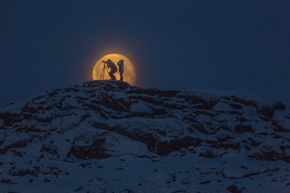 Niore Iqalukjuak captured this magical image of Jack Willie and his daughter Christy, who were taking their own photos, in Victor Bay, which Iqalukjuak said is over the hill from Arctic Bay, on Saturday, Nov. 24. (PHOTO BY NIORE IQALUKJUAK) 