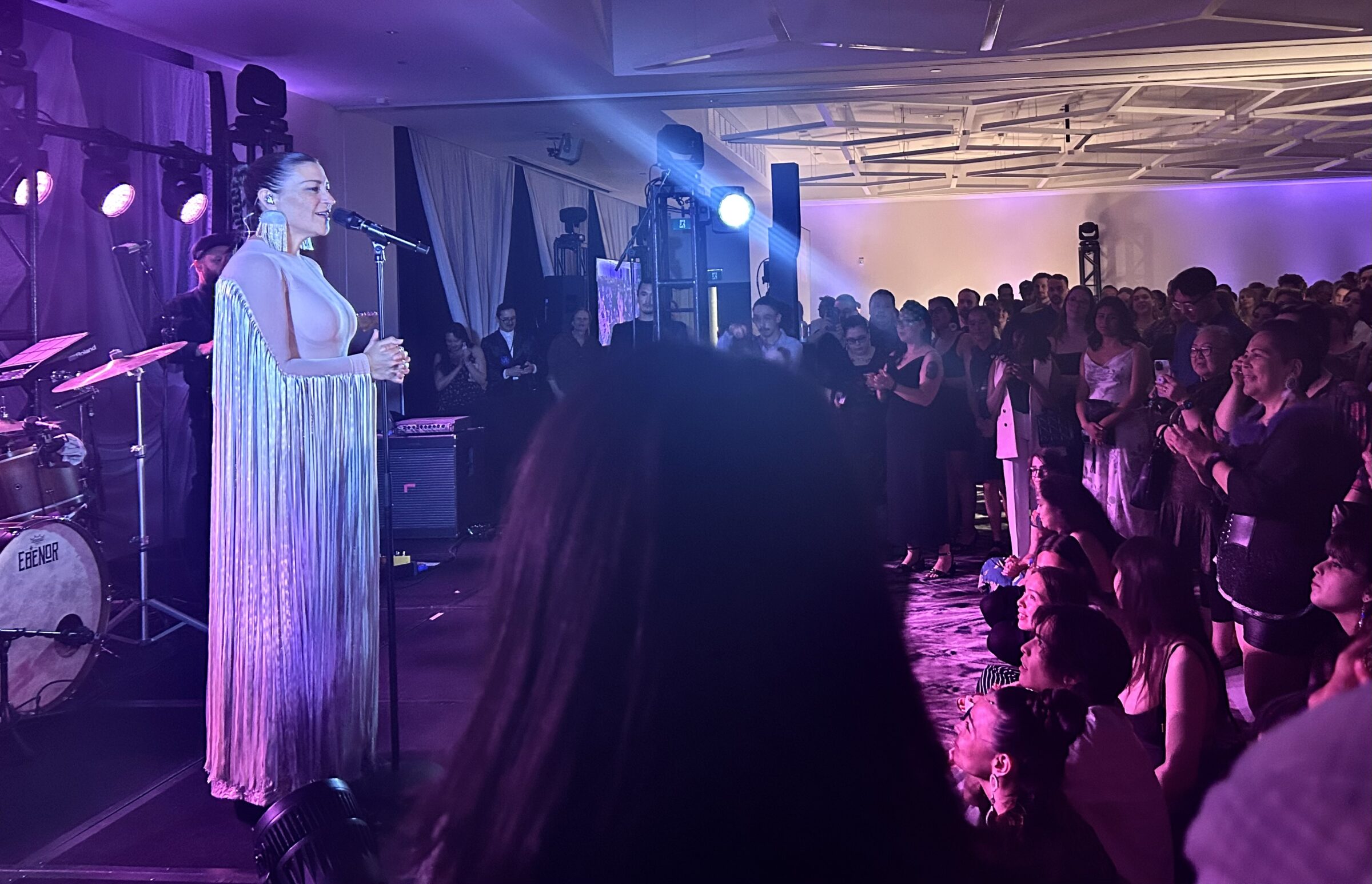 Salluit-born singer Elisapie performs at the National Arts Centre Tuesday in Ottawa during Inuit Tapiriit Kanatami’s Tapiriit 2025 celebration. The singer-songwriter captivated the crowd with songs from her 2023 album “Inuktitut,” inviting them to dance along to reimagined hits like Cyndi Lauper’s “Time After Time” and Queen’s “I Want to Break Free,” as well as her single “Wolves Don’t Live by the Rules.” (Photo by Nehaa Bimal) 