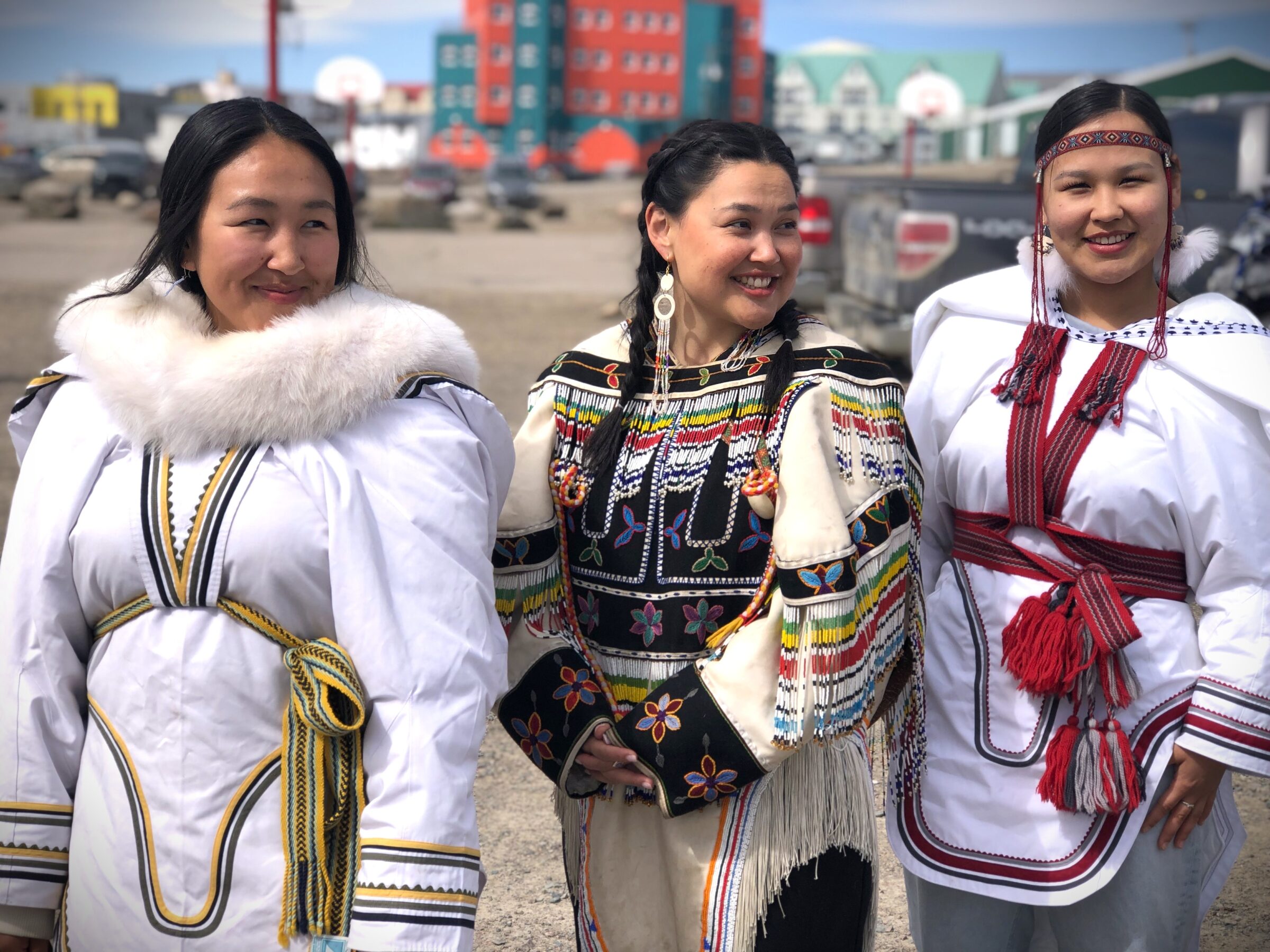 Greenlandic tourists Paninnguaq Nathansen, left, Sofie Amondsen and Nora Christensen explore Iqaluit on Saturday. The Greenlandic trio are visiting the territorial capital to attend the Iqaluit Christian Fellowship youth conference, which runs until Wednesday.  (Photo by Daron Letts)
