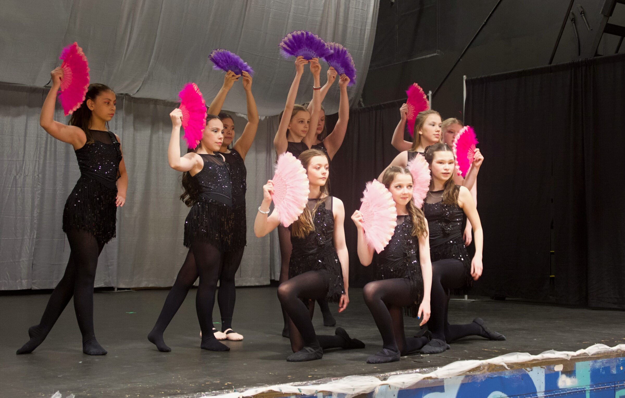Iqaluit Dance Academy’s 12-year-old and older jazz dancers rehearse their routine, set to “Vogue” by Madonna, on Saturday. The group performed the dance Sunday as part of a year-end recital for a packed Inuksuk High School gym. (Photo courtesy of Iqaluit Dance Academy)